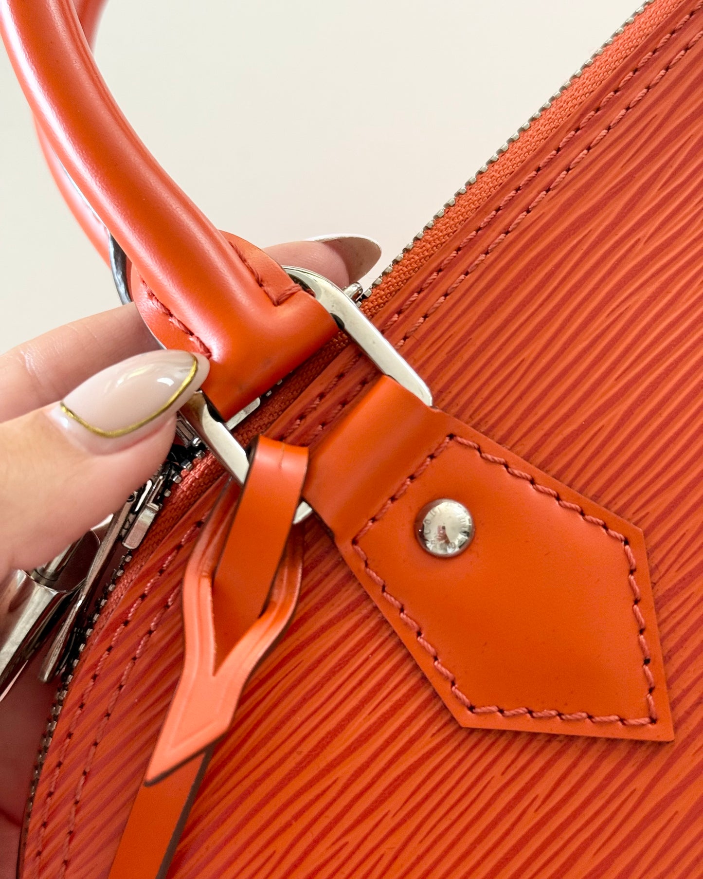 Louis Vuitton Limited Color Orange Epi Leather Alma PM from 2013