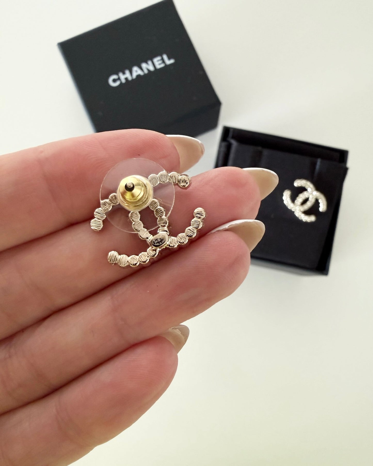 Chanel Light Goldtone Crystal Logo Studs