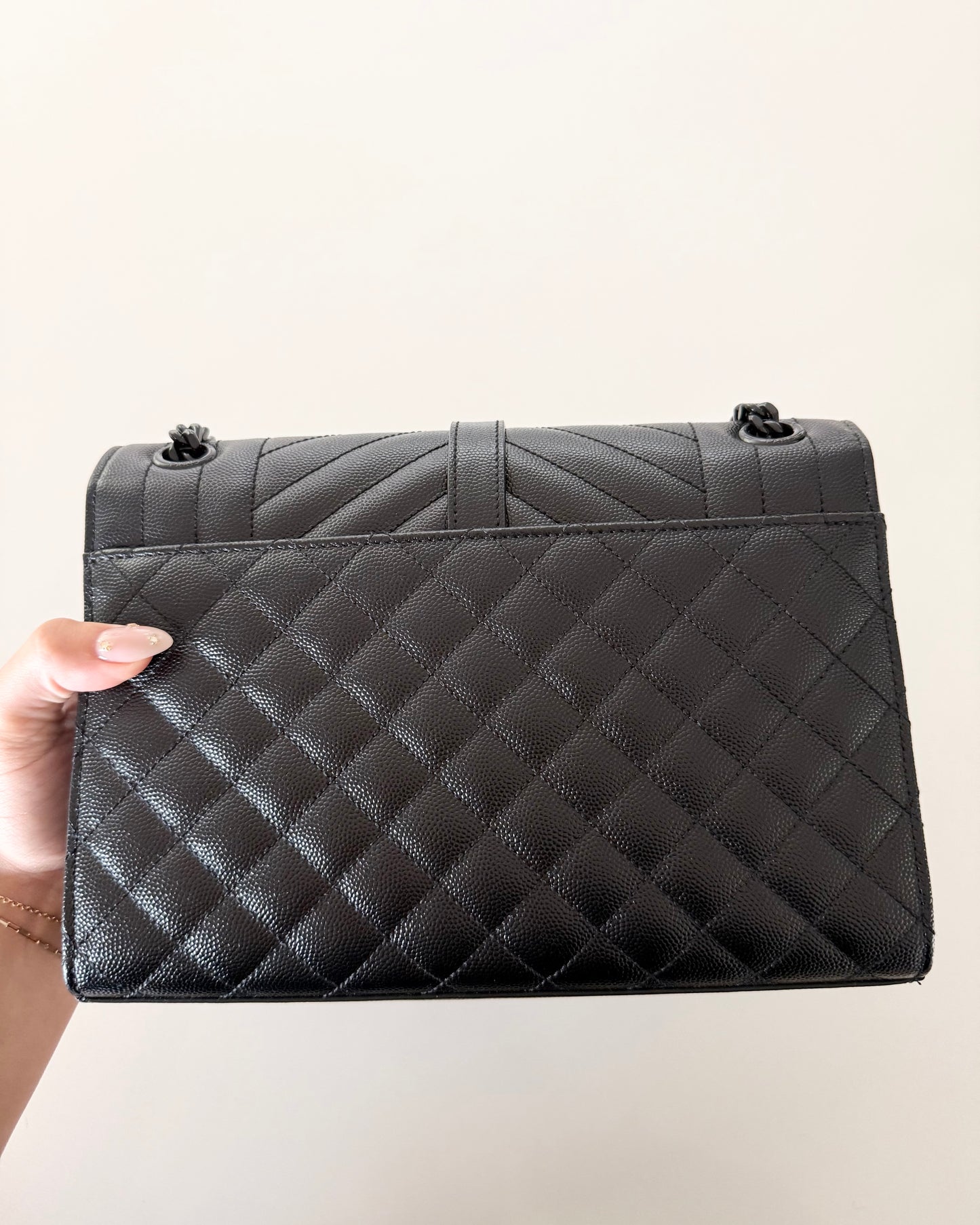 Saint Laurent So Black Leather Tri-Quilted Medium Chevron Envelope Bag from 2018