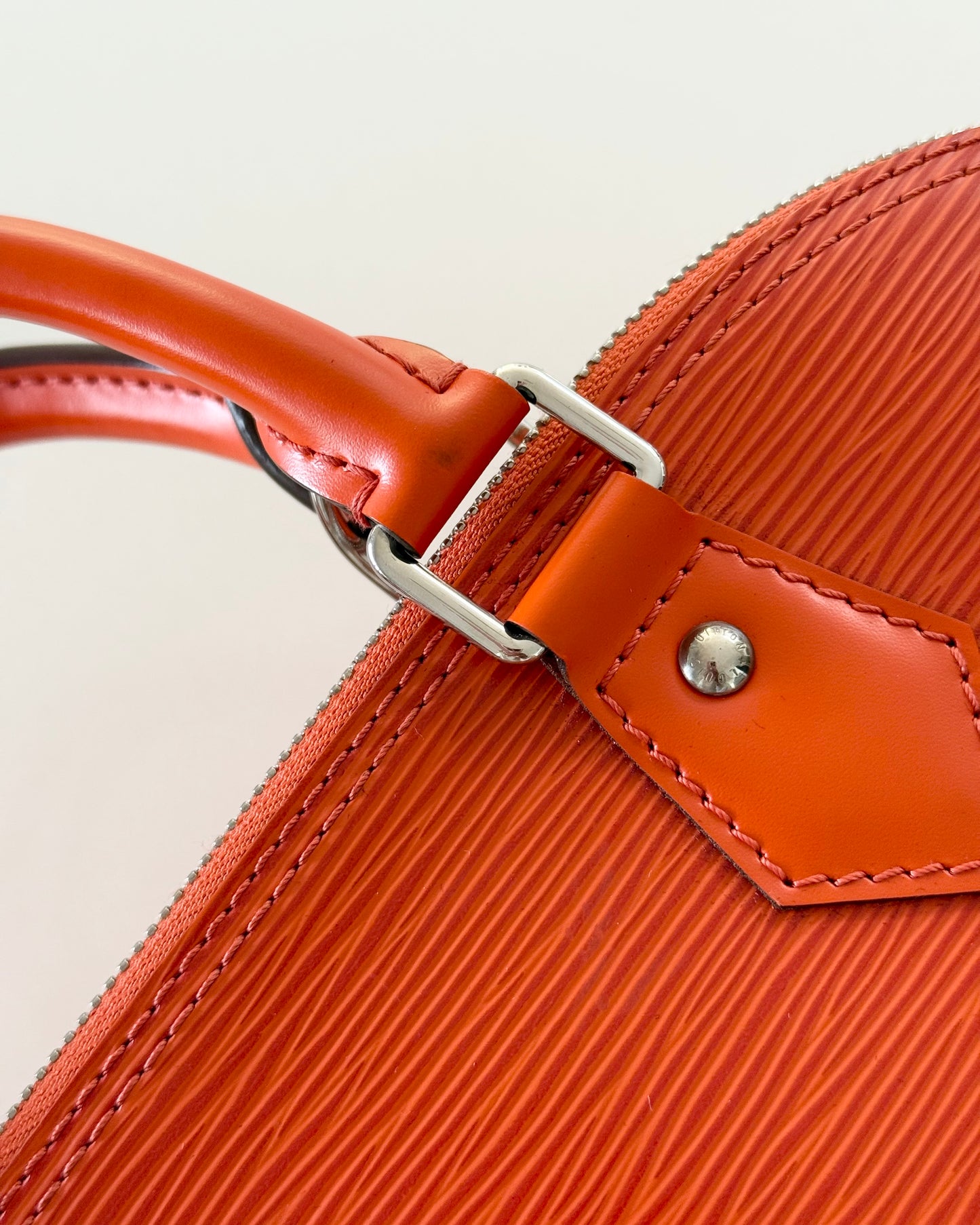 Louis Vuitton Limited Color Orange Epi Leather Alma PM from 2013