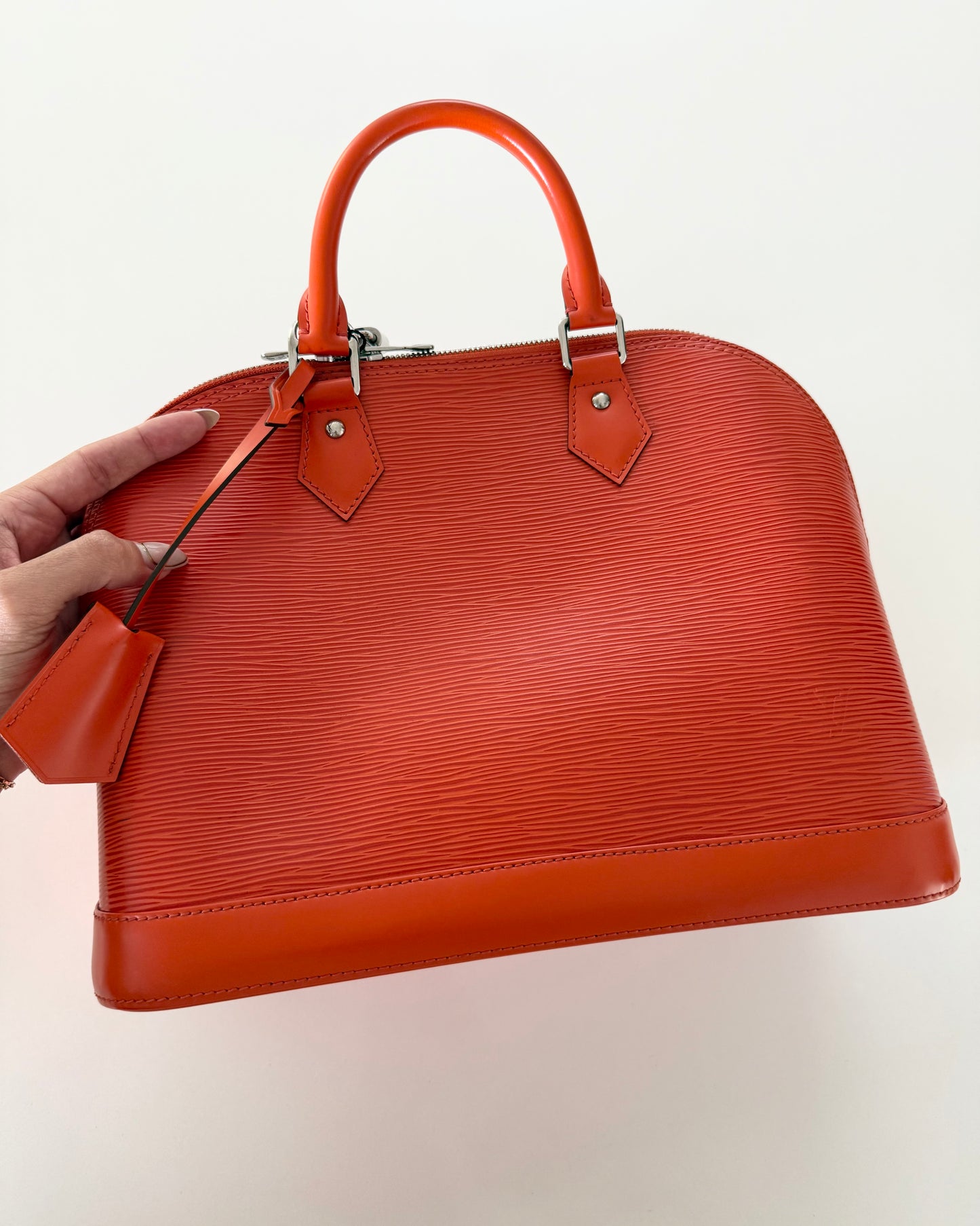 Louis Vuitton Limited Color Orange Epi Leather Alma PM from 2013