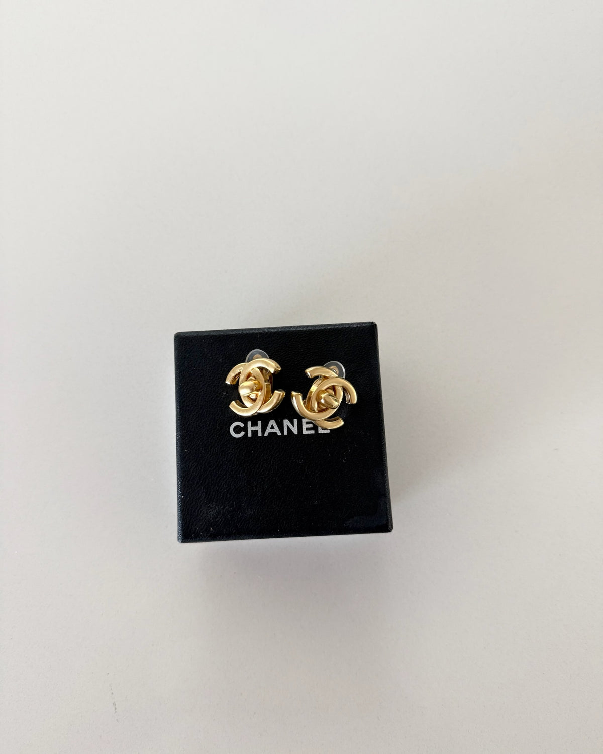 Chanel Vintage 1996 Goldtone Turnlock Clip Earrings