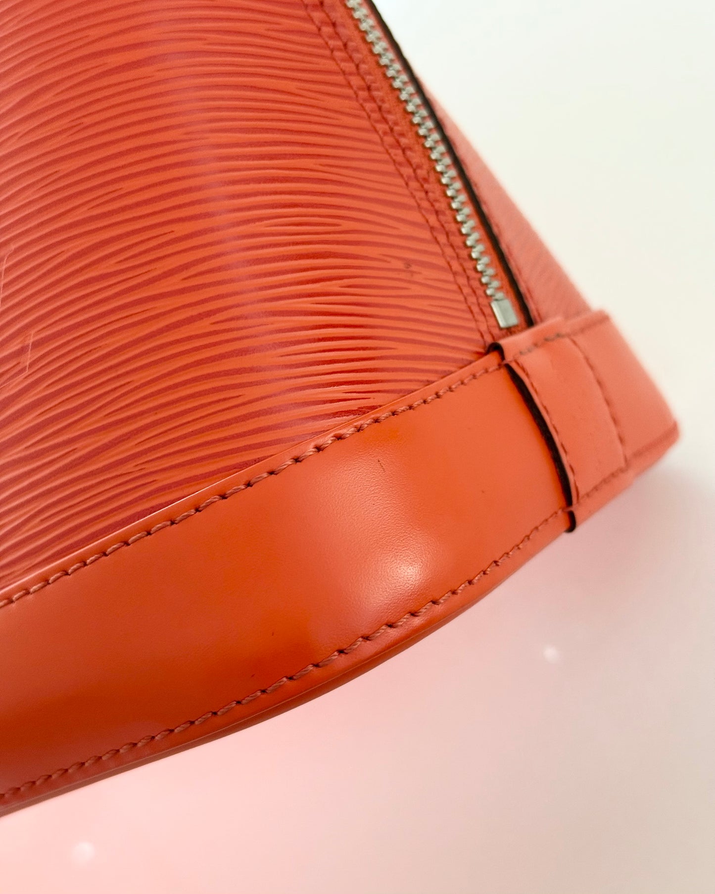 Louis Vuitton Limited Color Orange Epi Leather Alma PM from 2013