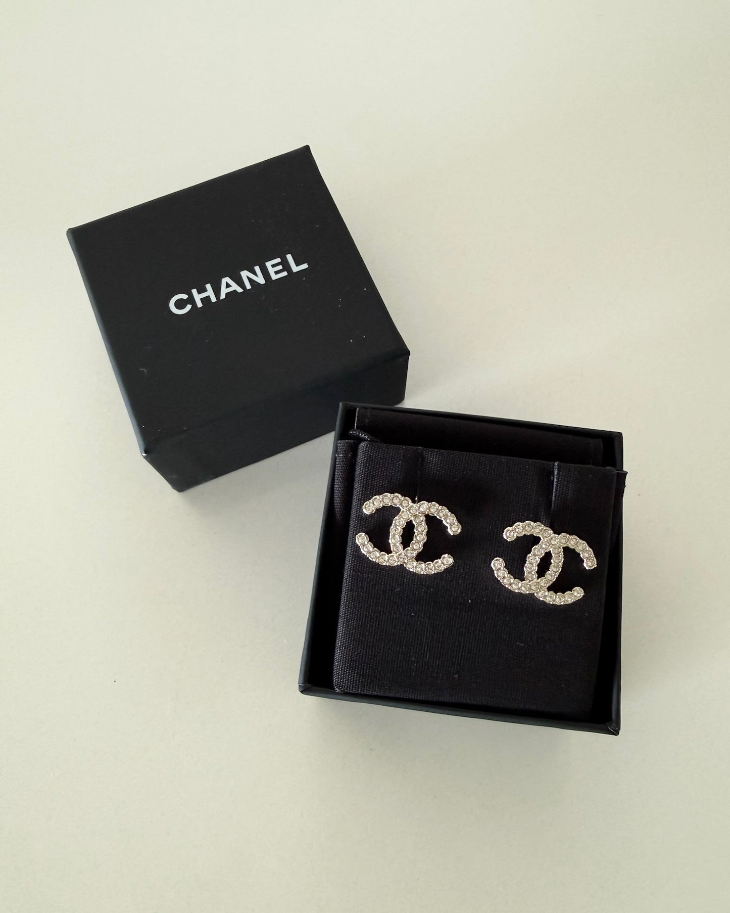 Chanel Light Goldtone Crystal Logo Studs