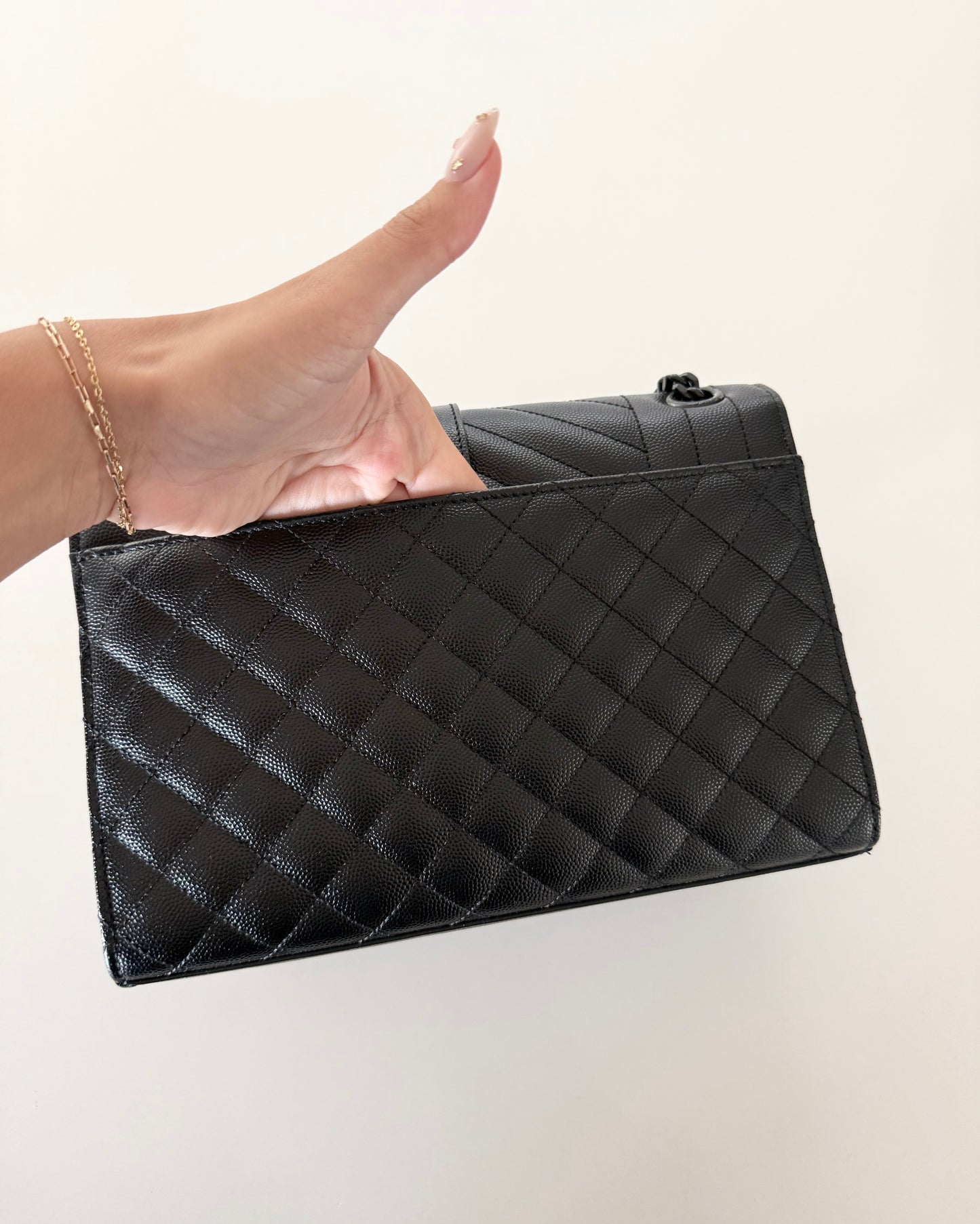 Saint Laurent So Black Leather Tri-Quilted Medium Chevron Envelope Bag from 2018