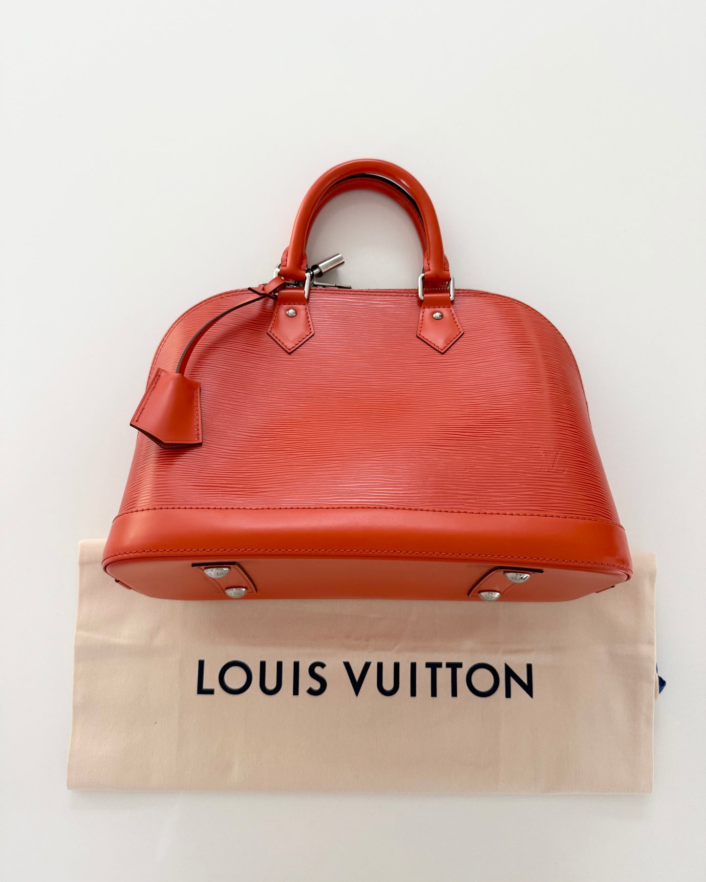 Louis Vuitton Limited Color Orange Epi Leather Alma PM from 2013