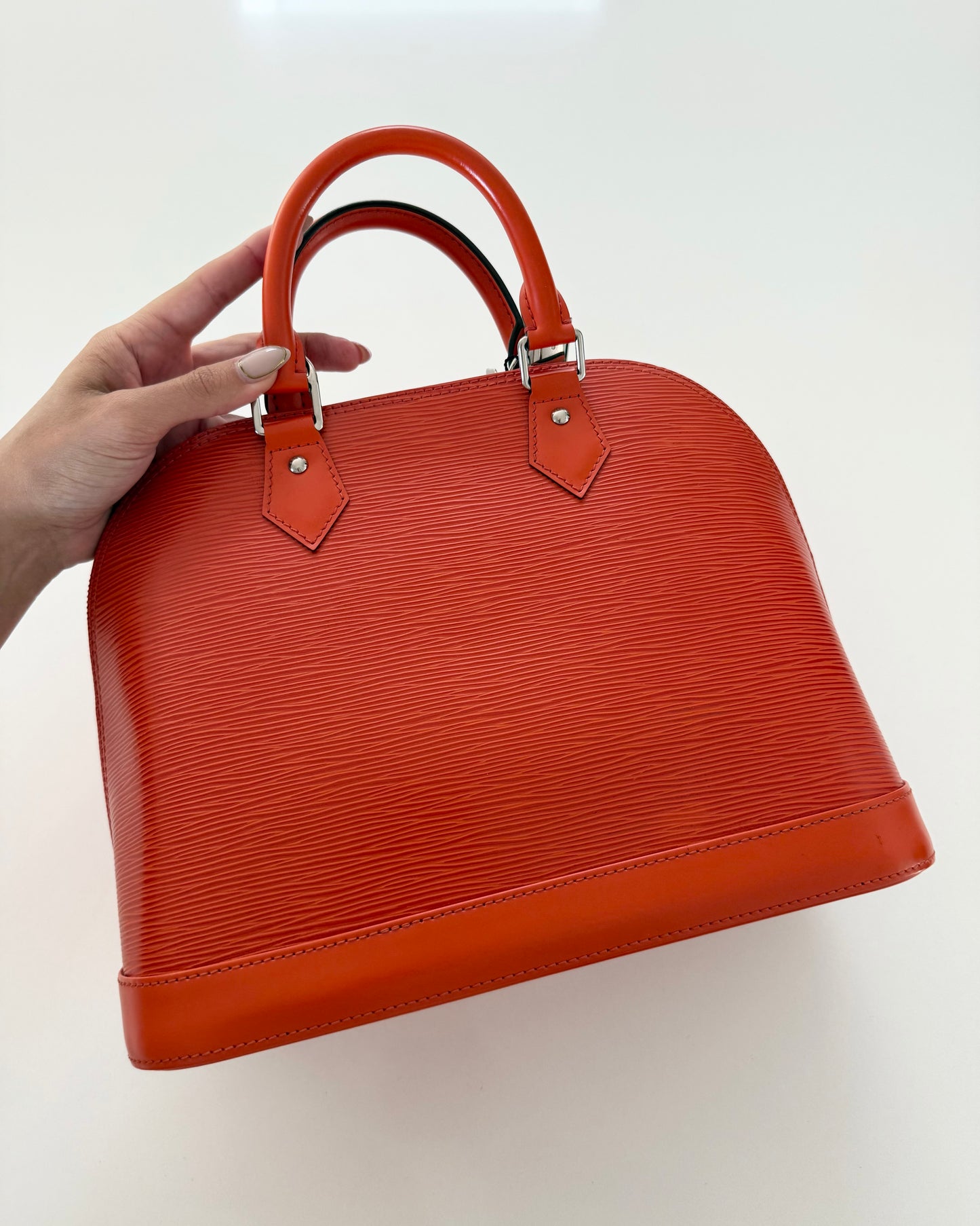 Louis Vuitton Limited Color Orange Epi Leather Alma PM from 2013