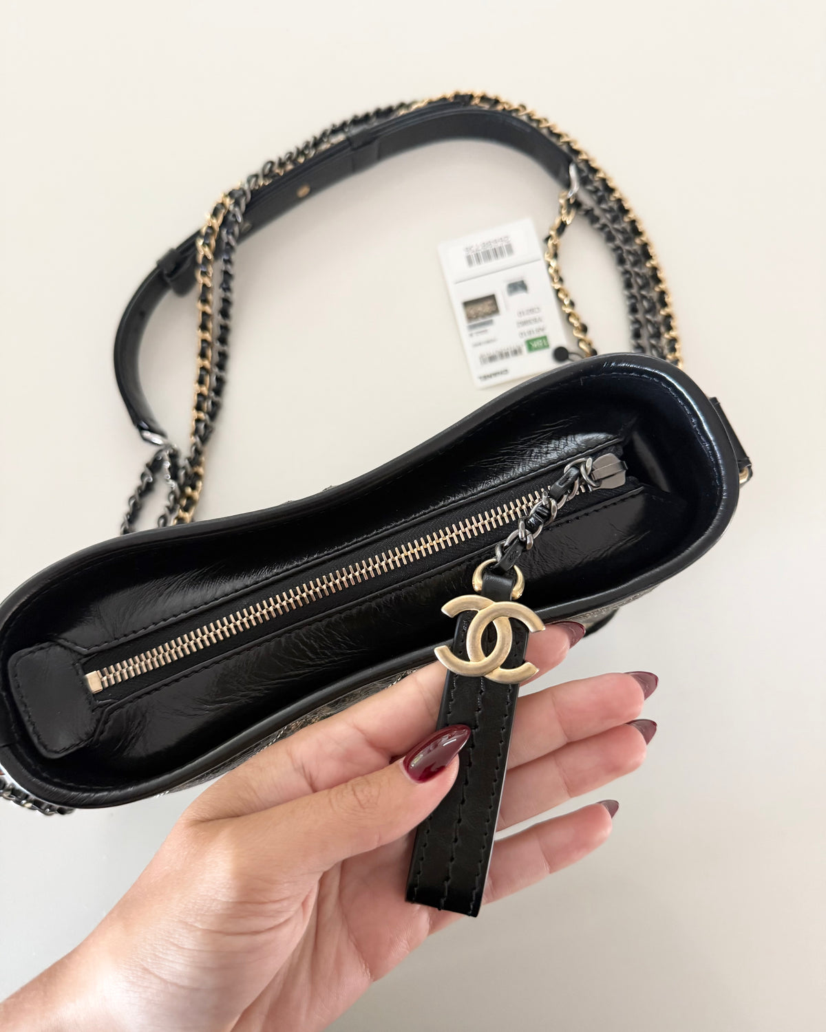 Chanel Black and Gold Gabrielle Mini Hobo Bag 26 series from 2018